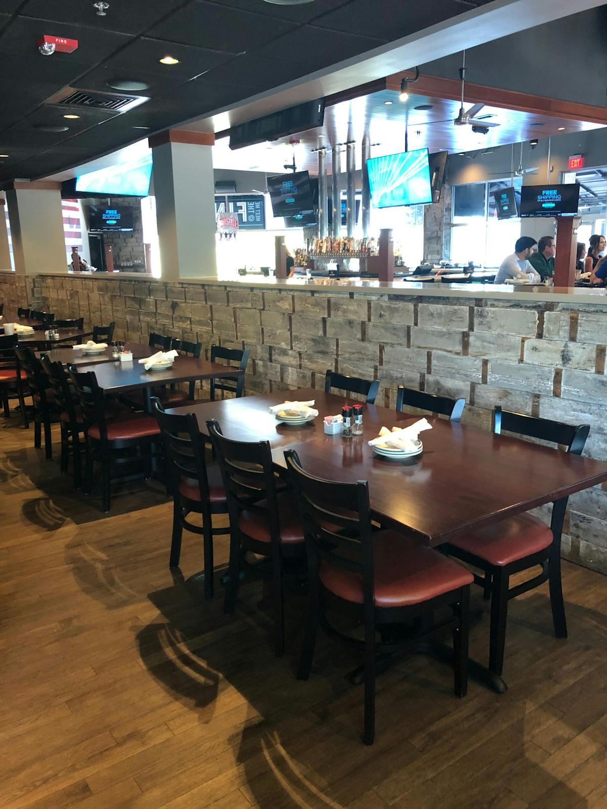 The Semi-Private Dining Area at Blackfinn, one long table set for a group.